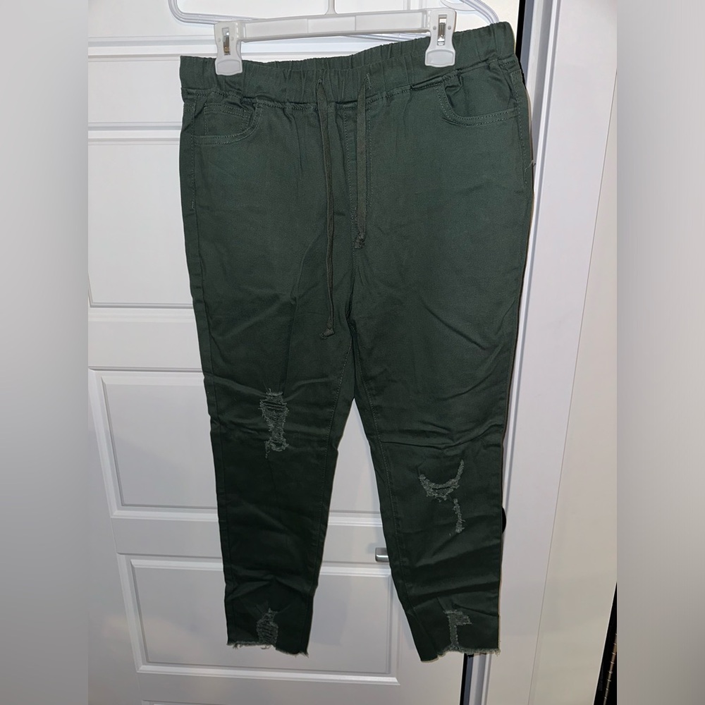 Dark green distressed pants